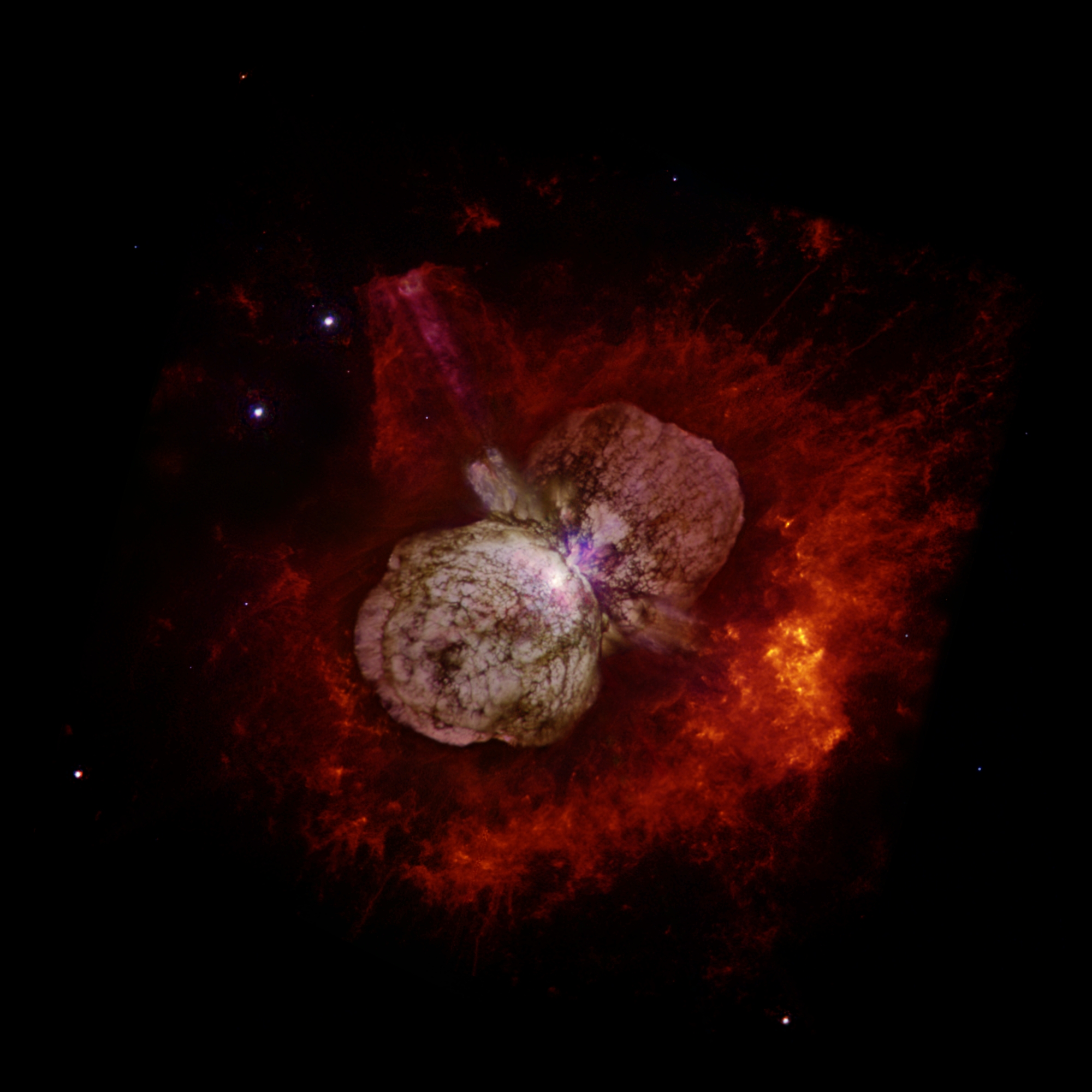 A huge red cloud of gas and dust in space.