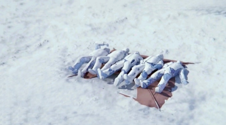 The first five bodies to be found. with leader Kuznetsov with his hands up trying to hold the tent against the wind.