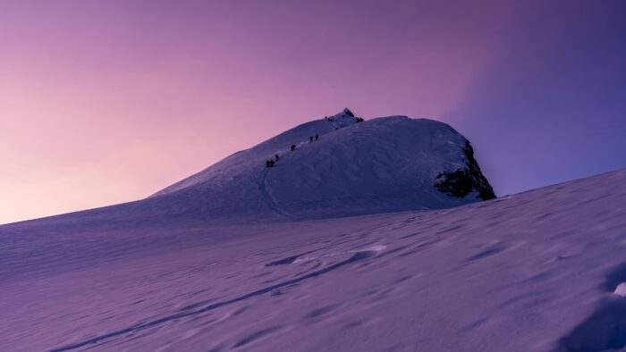 Manaslu summit ridge in purple lights.