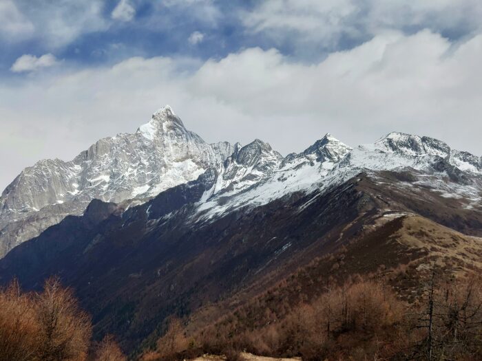 Mt. Siguniang massif over grassy slopes.