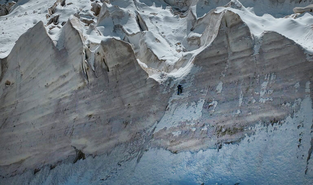 Bargiel skiing on a vertical, big serac.