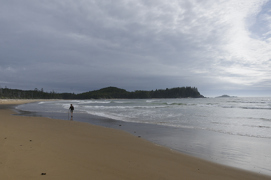 sandy beach and hiker