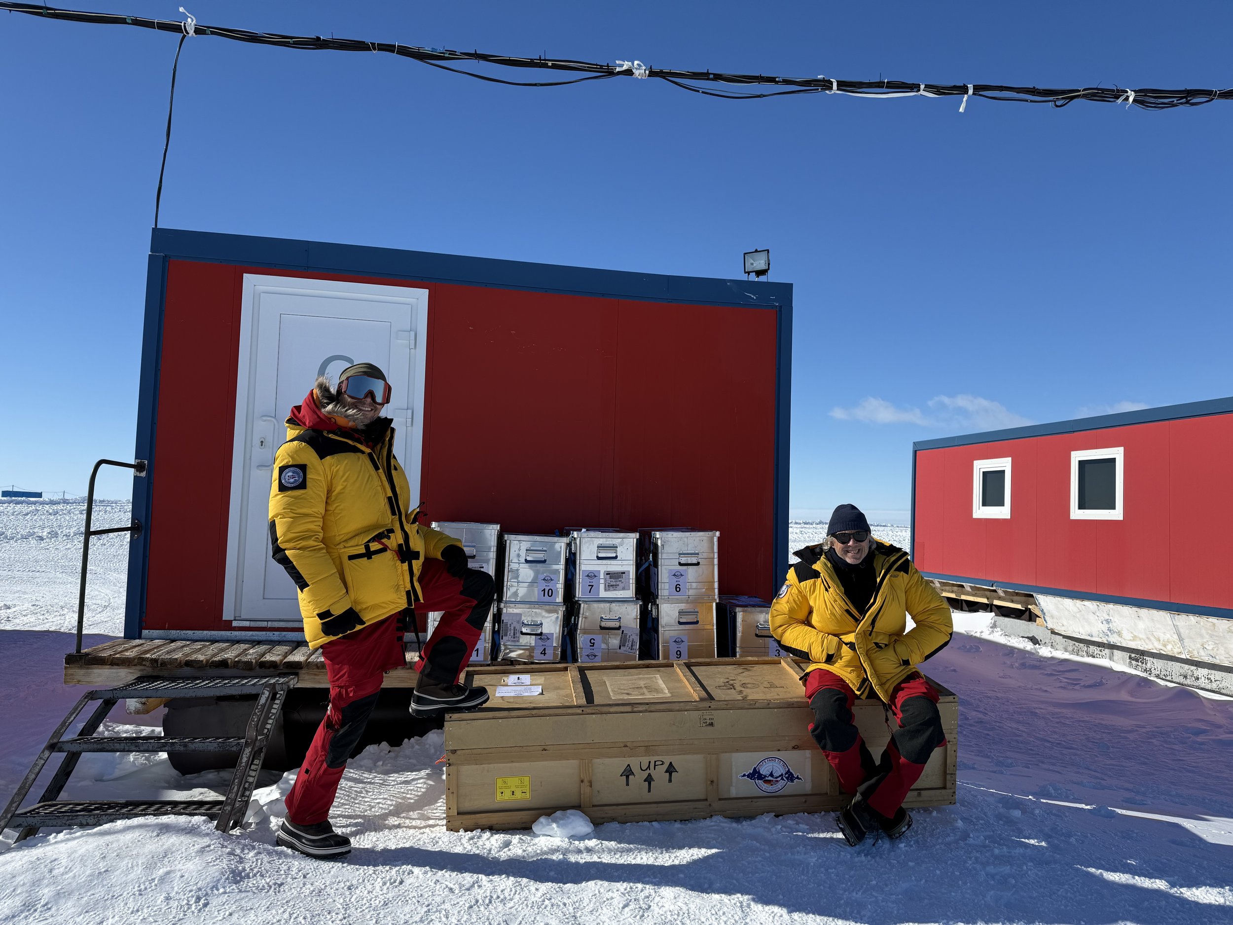 Two men in polar gear at Troll research station
