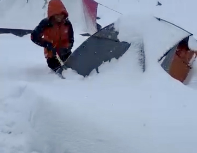 Michelle Dvorak cleaning the tent.