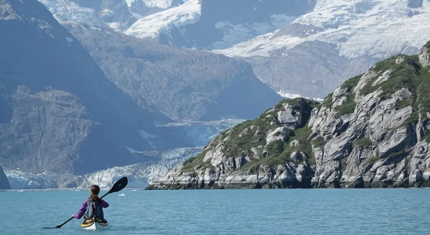 kayaker in mountainous scenery