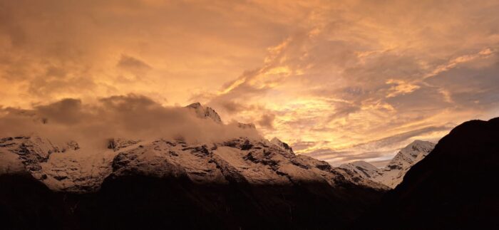 Cloudy skies in peach colors over the south side of Cho Oyu.