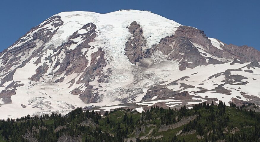 A snow capped purple mountain