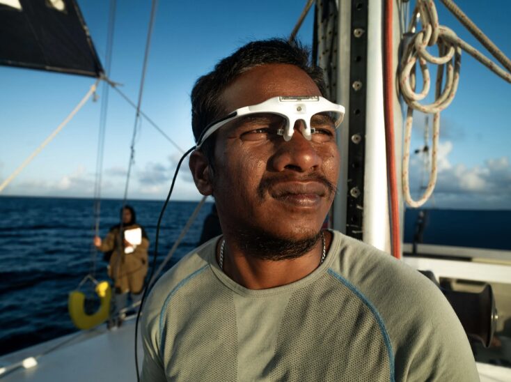 A Marshallese sailor wearing the eye tracking glasses during the study