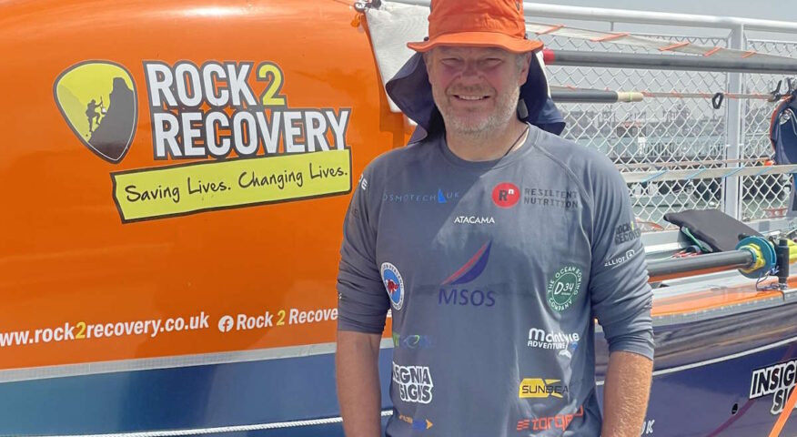 Dave 'Dinger' Bell stands infront of his boat before starting his row across the Pacific and Indian Oceans