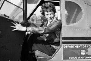 Amelia Earhart in a cockpit