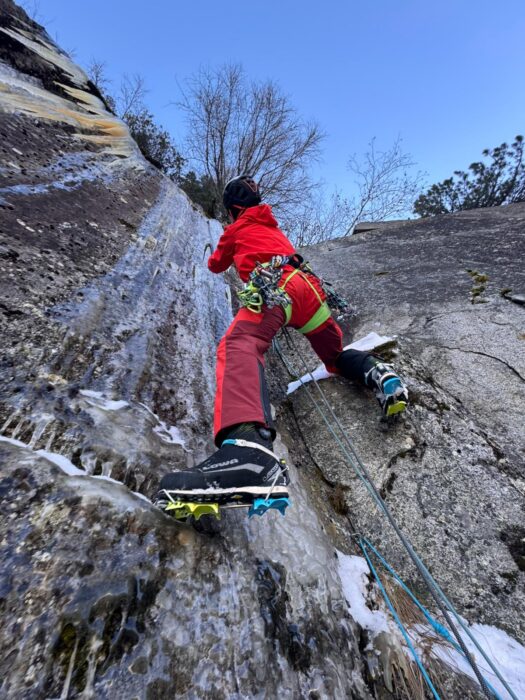 A climber on a mixed granite slab. 
