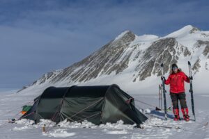 A woman and a tent in Antarctica