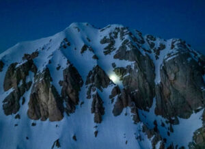 headlamp on mountain at night