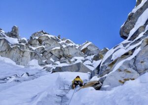 Climbing on hard ice on Aikache Chhok.