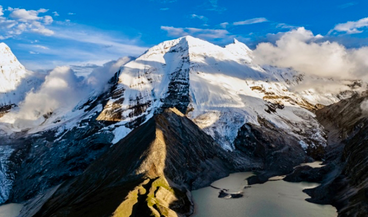 Chomolhari III in the center, with the north spur facing the camera.