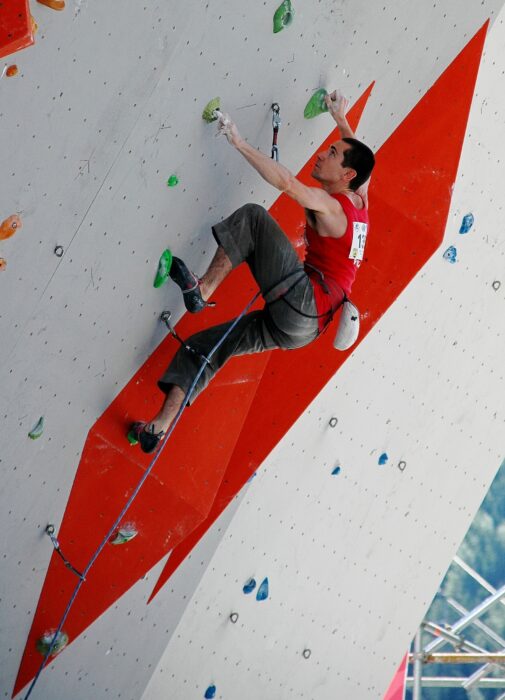 sport climber on indoor wall