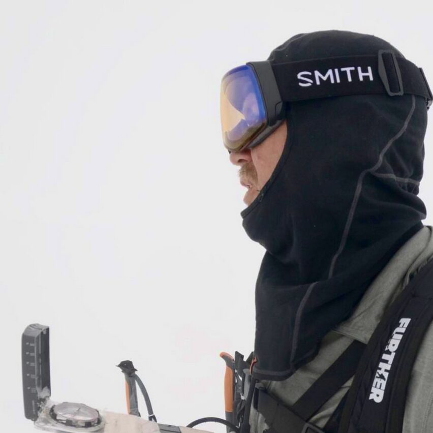 A man in a completely white landscape. It's like a transparent png out there