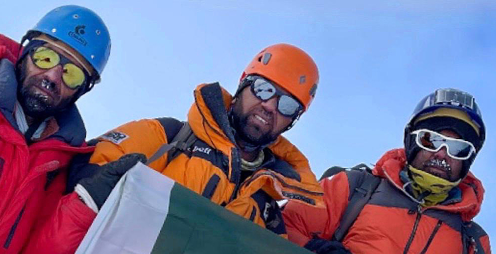 reflection of slope in climbers' sunglasses