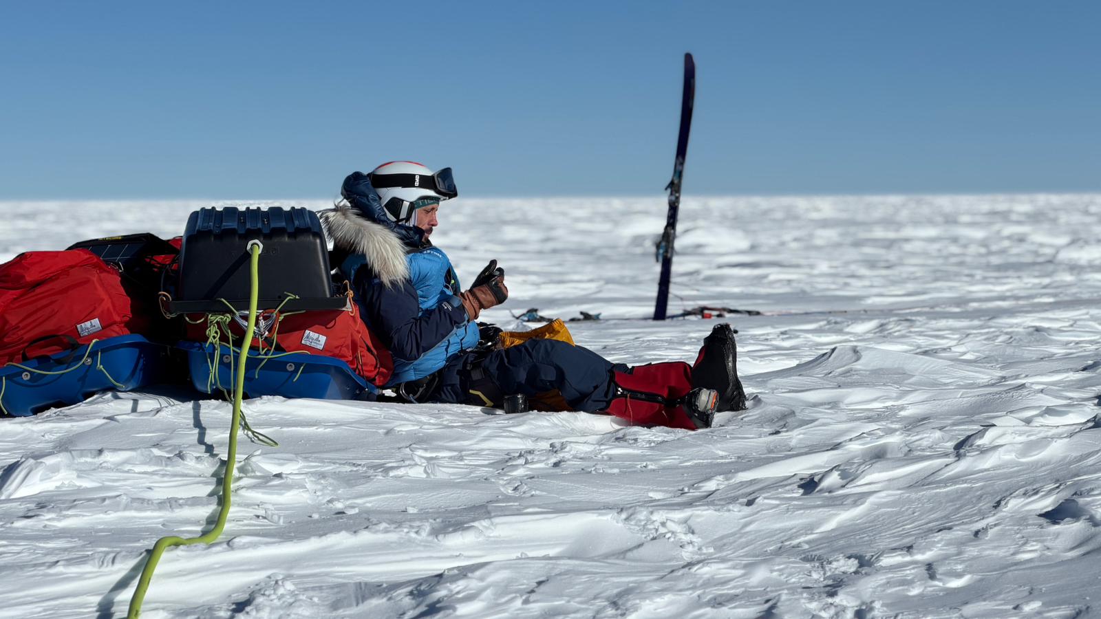 A man sitting in the snow
