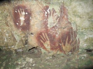 Human handprints on a cave wall