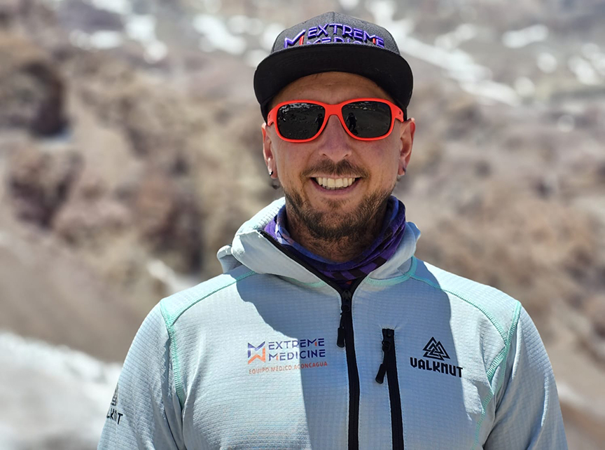 portrait of guy in fleece jacket on mountain