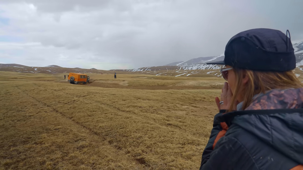 A truck stuck in the mud, no road in sight
