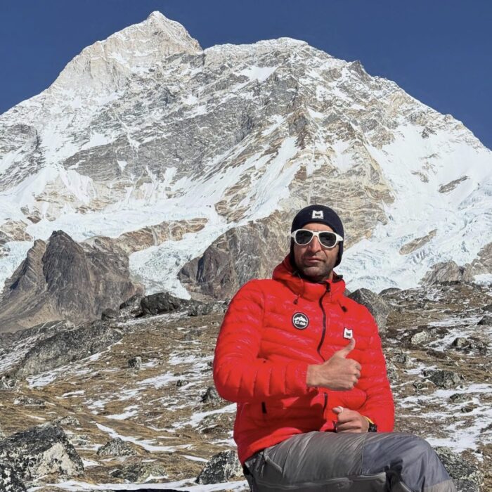 A climber with Makalu behind him.