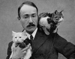 victorian era man with two cats