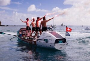 44West light their flares as they are crowned the winning crew