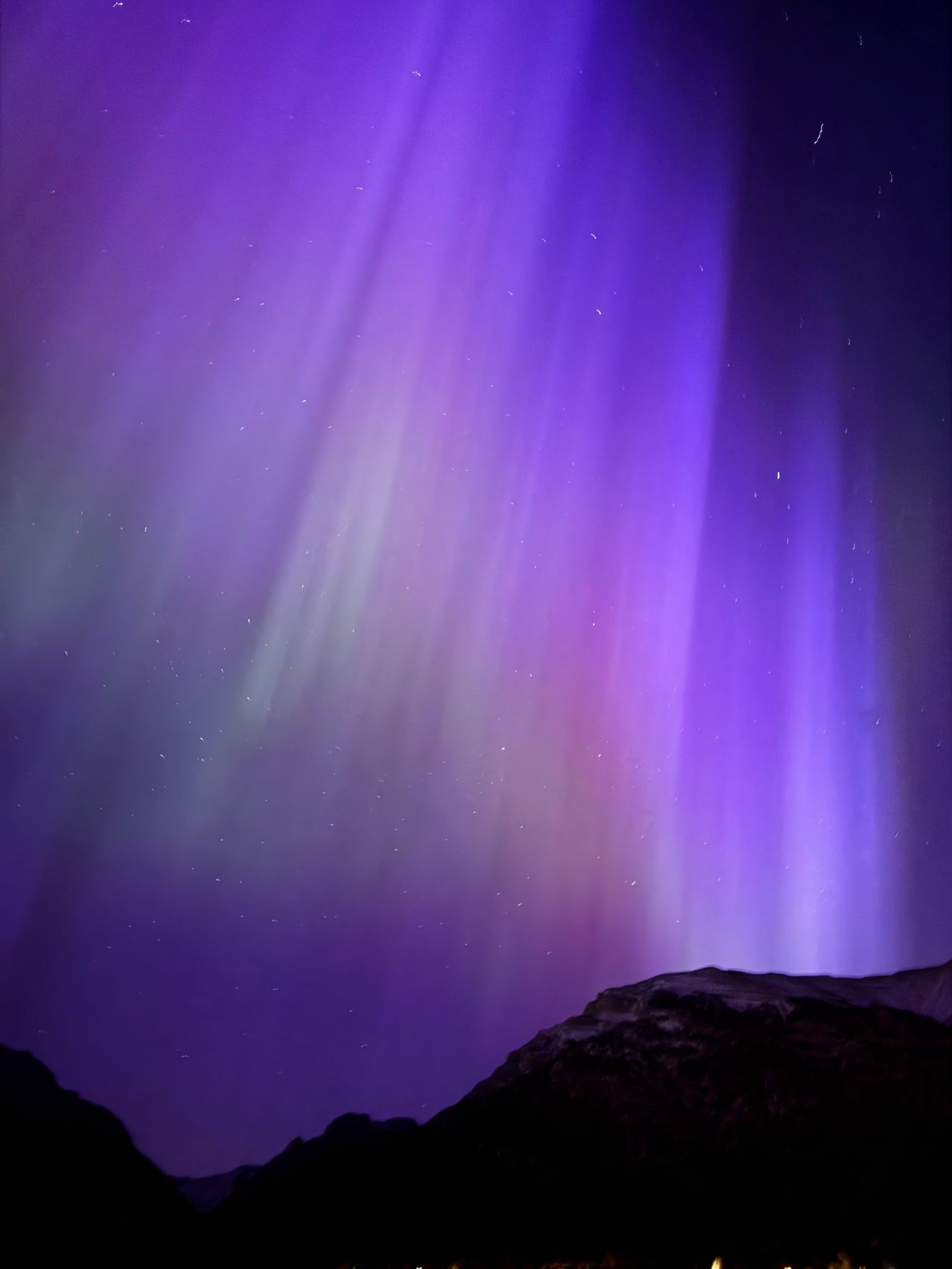 Purple, red and green aurora displays seen in the sky over Canada because of the solar storms 