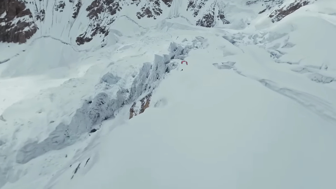 A man paragliding on K2