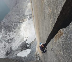a climber on a vertical crack at Torres del Paine.