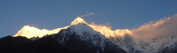 Chongra peak and Nanga Parbat in the sunlight. 