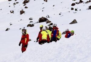 Italian Alpine rescuers at an avalanche scene in South Tyrol.