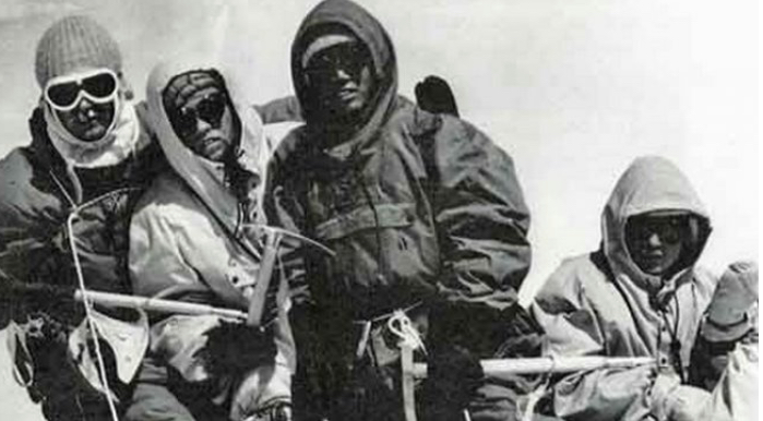 Albin Schelbert, Nawang Dorje, Nima Dorje, and Ernst Forrr at the summit of Dhaulagiri I in 1960.