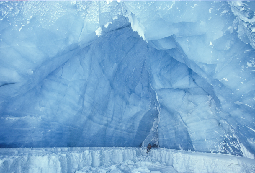 small figure in ice cave