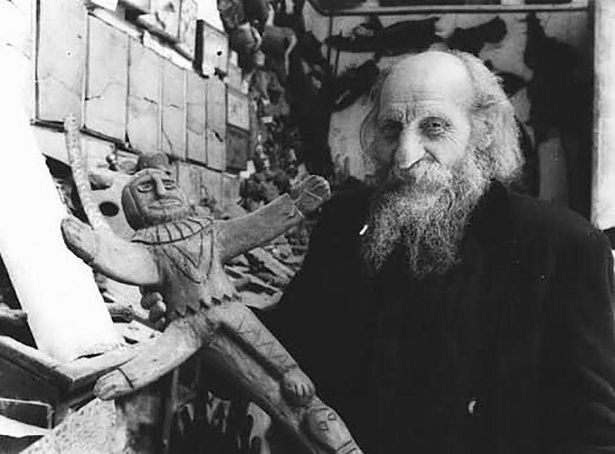 black and white pic of an old bearded man