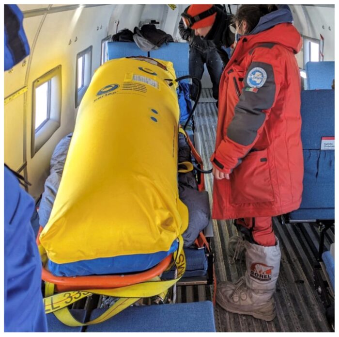 Patient cocooned in hyperbaric chamber on air flight in Antarctica