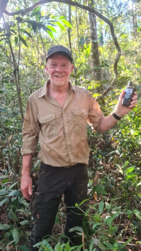 Briton Chris Brown stands surrounded by jungle at the South American Pole of Inaccessibility