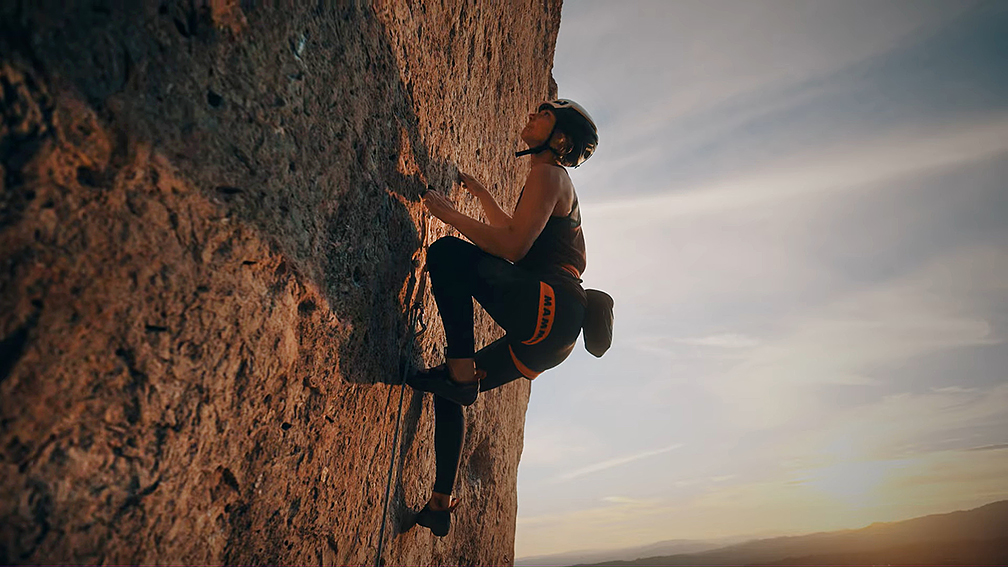 a woman climbing