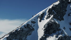 Two people on a snowy slope