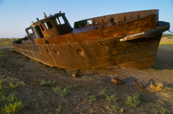 rusted boat in desert