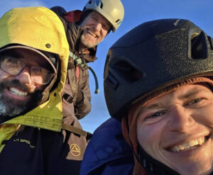 American climbing team on the summit of Torres del Paine after opening a new route.