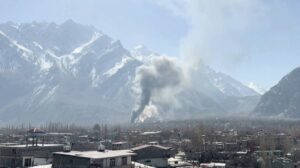 A column of smoke rises from Skardu