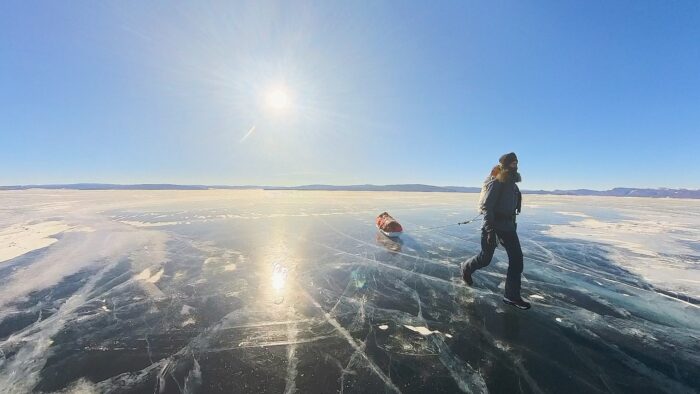 Anja Blacha, German adventurer, dragging a sled across the ice of Lake Khovsgol, Mongolia