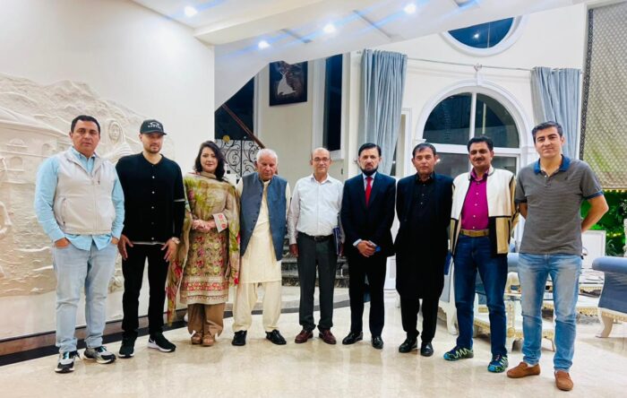 A group of people posing for the photo. 