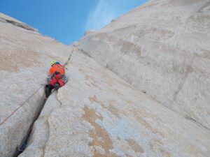 A climber on a vertical crack on Fitz Roy.