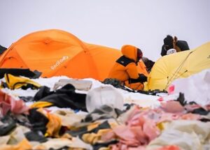 rags of tents cover the ground.