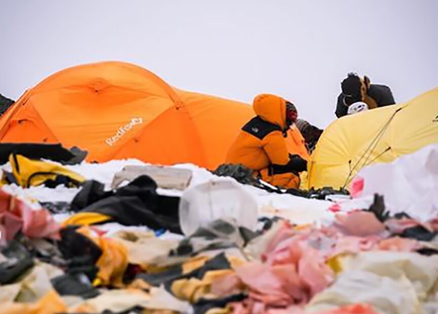 rags of tents cover the ground.