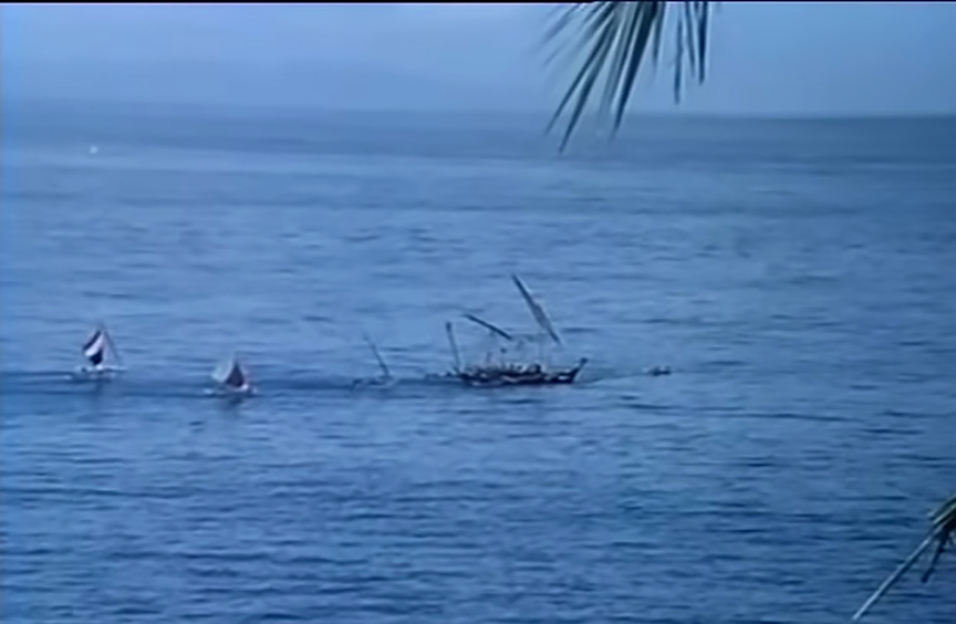 Small boats departing a bay